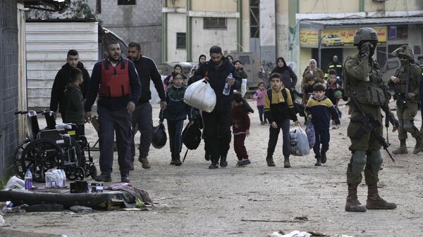 Residentes del campo de refugiados cisjordano - Sputnik Mundo