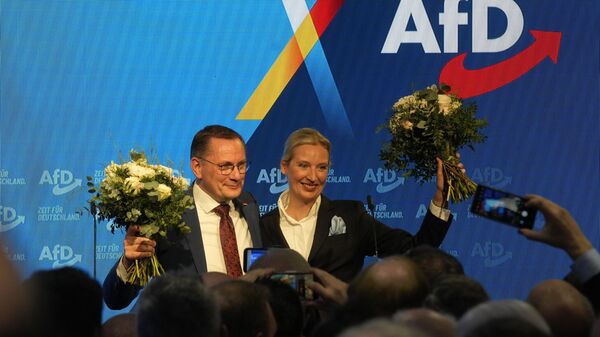Los líderes de la ultraderechista AfD Alice Weidel y Tino Chrupalla - Sputnik Mundo