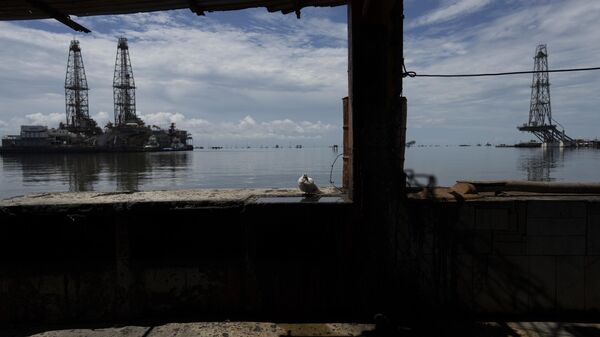 Pozos petroleros en la Costa Oriental del Lago de Maracaibo en Cabimas, estado Zulia, Venezuela - Sputnik Mundo