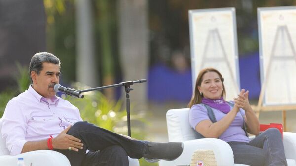El presidente Nicolás Maduro participó en un evento por el Día Internacional de la Mujer en Caracas. - Sputnik Mundo