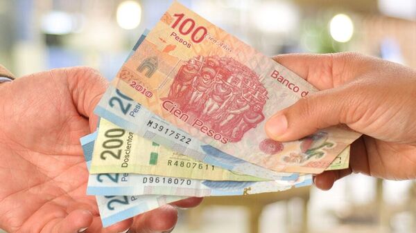 El peso mexicano es una de las monedas de mayor interés en los últimos tiempos. - Sputnik Mundo