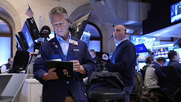 Los mercados de valores en Wall Street han tenido diversas reacciones por los aranceles. - Sputnik Mundo