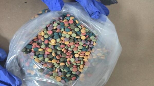 Autoridades mexicanas incautaron más de 5.000 pastillas de fentanilo en una empresa de paquetería en Jalisco. - Sputnik Mundo