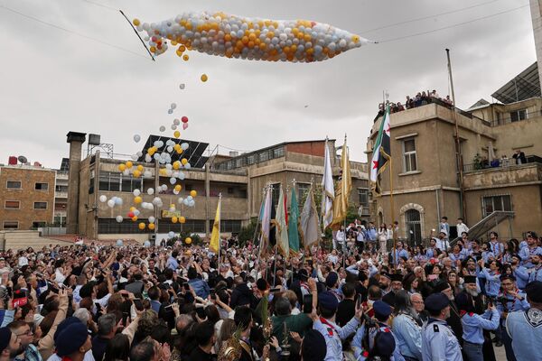 Fieles de la Iglesia ortodoxa griega celebran el Domingo de Ramos en uno de los suburbios predominantemente cristianos de la capital siria, Damasco. Fieles de la Iglesia ortodoxa griega celebran el Domingo de Ramos en uno de los suburbios predominantemente cristianos de la capital siria, Damasco. - Sputnik Mundo