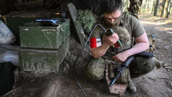 Soldado ruso en la zona de la operación militar especial  - Sputnik Mundo