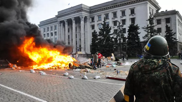 Disturbios masivos frente a la Casa de los Sindicatos en la ciudad ucraniana de Odesa, el 2 de mayo de 2014 - Sputnik Mundo
