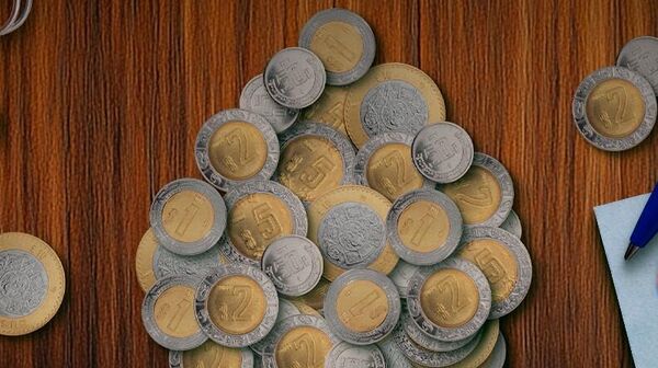 El peso mexicano nuevamente está por debajo de las 20 unidades por dólar. - Sputnik Mundo