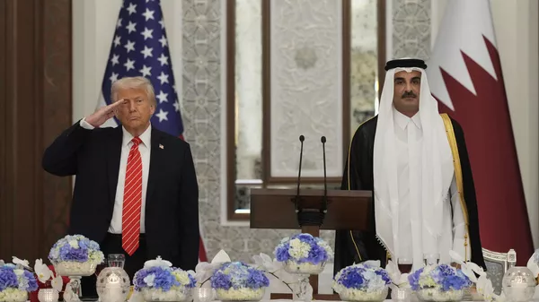 El presidente de EEUU, Donald Trump, y el emir de Catar, Tamim bin Hamad al-Thani - Sputnik Mundo
