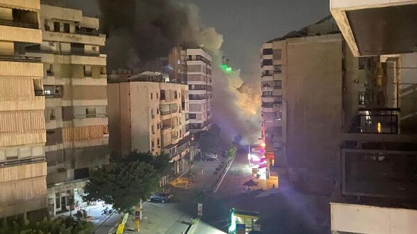 Habitantes de suburbio al sur de Beirut evacúan la zona ante amenaza de bombardeos israelíes - Sputnik Mundo