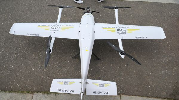 El sistema aéreo no tripulado AIST de Drone Solutions en la 13.ª conferencia Startup Village, en el Centro de Innovación Skolkovo. - Sputnik Mundo
