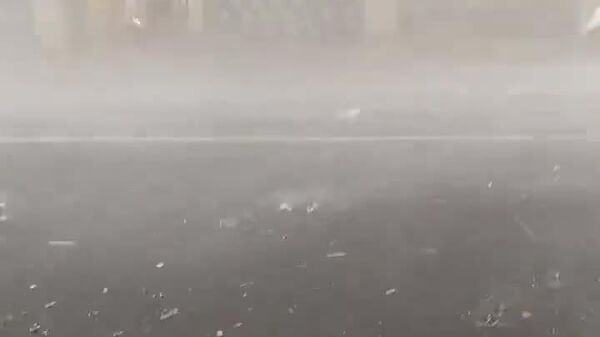 Granizo, lluvias torrenciales y fuertes vientos: avistan 'el apocalipsis meteorológico' en una ciudad china - Sputnik Mundo