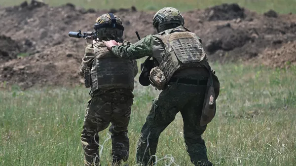 Soldados rusos en la zona de la operación militar especial en Ucrania - Sputnik Mundo