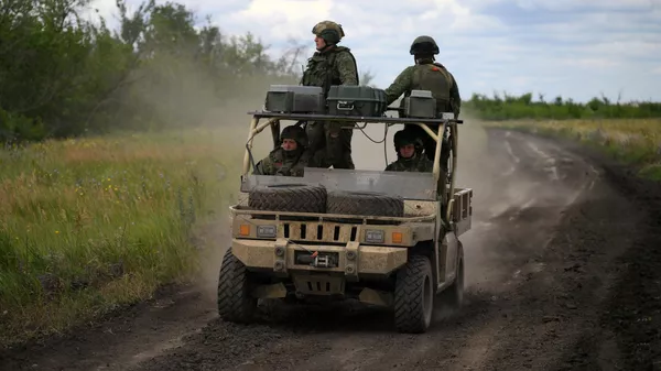 Soldados rusos en la zona de la operación militar especial  - Sputnik Mundo