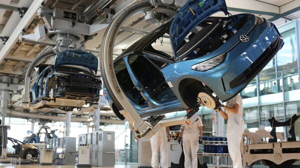 Empleados del fabricante de automóviles alemán Volkswagen  - Sputnik Mundo
