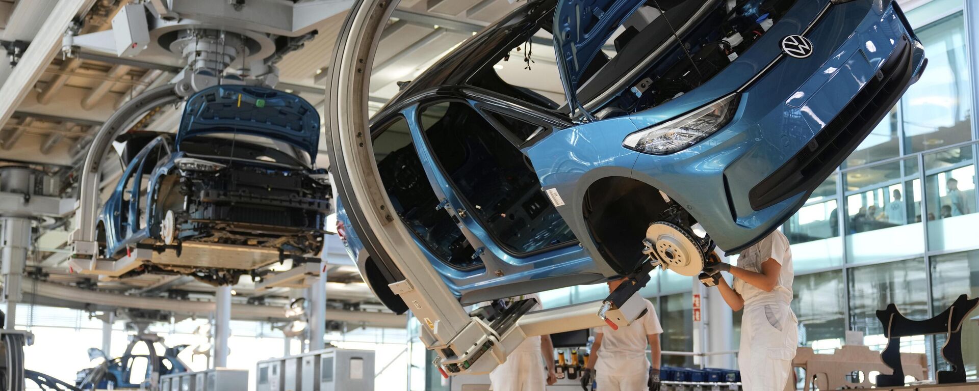 Empleados del fabricante de automóviles alemán Volkswagen  - Sputnik Mundo, 1920, 09.12.2025