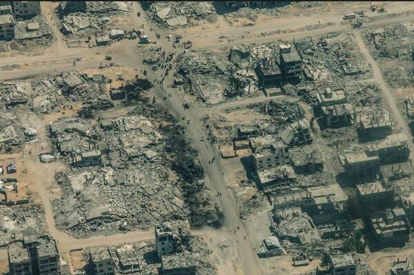 El horror de Gaza: escuelas y campos de refugiados reducidos a escombros - Sputnik Mundo