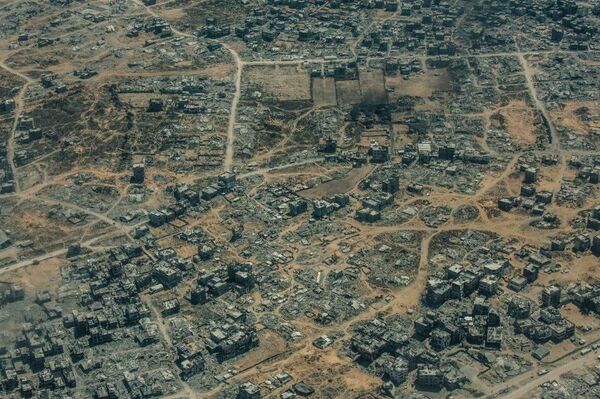 El horror de Gaza: escuelas y campos de refugiados reducidos a escombros - Sputnik Mundo