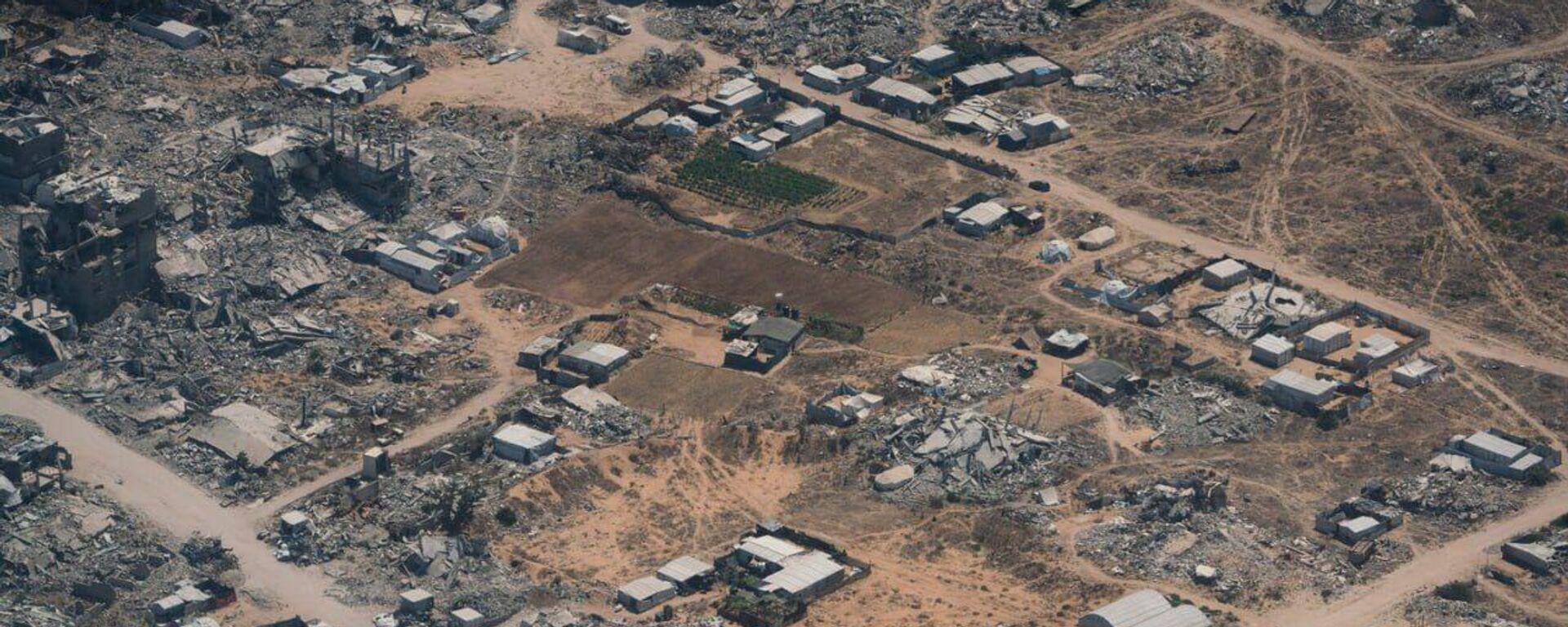 Gaza en ruinas: Fotografías aéreas revelan la destrucción total de la Franja de Gaza Gaza en ruinas: Fotografías aéreas revelan la destrucción total de la Franja de Gaza - Sputnik Mundo, 1920, 15.08.2025