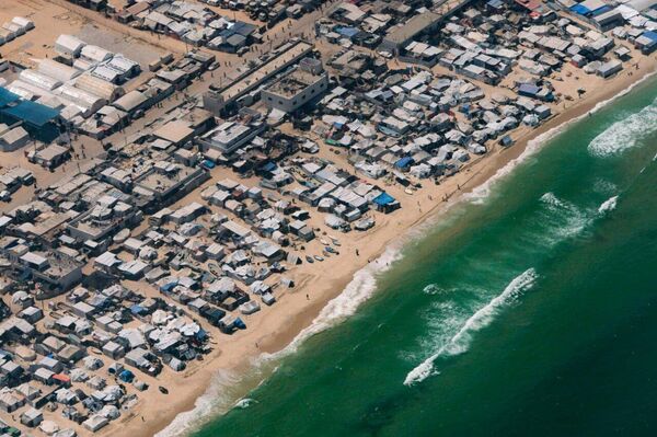 Gaza en ruinas: Fotografías aéreas revelan la destrucción total de la Franja de Gaza Gaza en ruinas: Fotografías aéreas revelan la destrucción total de la Franja de Gaza - Sputnik Mundo