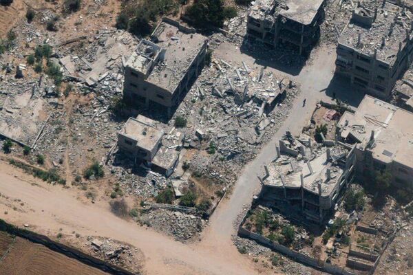 Gaza en ruinas: Fotografías aéreas revelan la destrucción total de la Franja de Gaza Gaza en ruinas: Fotografías aéreas revelan la destrucción total de la Franja de Gaza - Sputnik Mundo