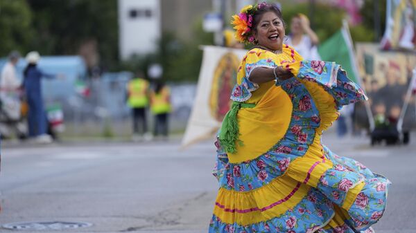 La población mexicana en Chicago no podrá festejar el día de la Independencia por las redadas. - Sputnik Mundo