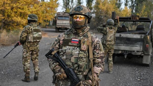 Soldados rusos en la zona de la operación militar especial  - Sputnik Mundo