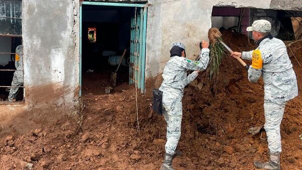 Suman 78 fallecidos a causa de las intensas lluvias que se registraron en México Suman 78 fallecidos a causa de las intensas lluvias que se registraron en México - Sputnik Mundo
