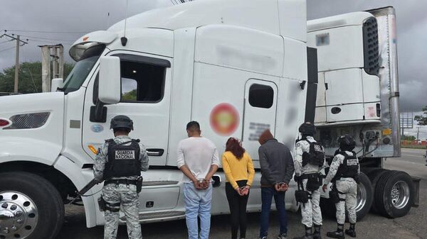 Detención realizada por elementos de la Guardia Nacional de México - Sputnik Mundo