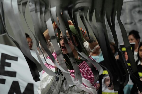 Una manifestación en defensa de los derechos humanos, celebrada durante la cumbre climática COP30 en Belén. - Sputnik Mundo