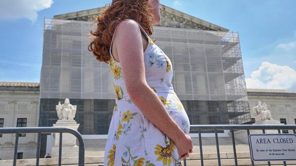 Mujer estadounidense embarazada - Sputnik Mundo