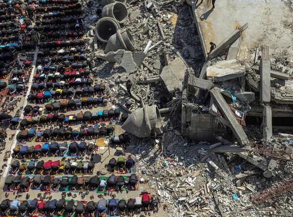 La obra de la serie de fotos Gaza: eco de un genocidio realizada por el fotógrafo palestino Abdelrahman Alkahlout. Ganador de la categoría Noticias principales. - Sputnik Mundo