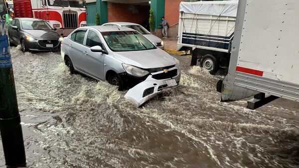 Daños ocasionados por las lluvias en la Ciudad de México - Sputnik Mundo
