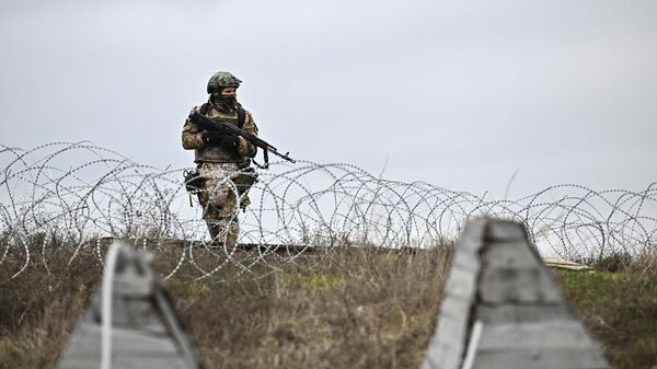 Soldado ruso en la zona de la operación militar especial - Sputnik Mundo