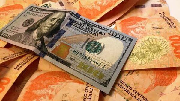 La actividad económica de Argentina registró en octubre su primera caída en cuatro meses - Sputnik Mundo