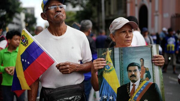 La población venezolana salió a las calles tras el secuestro de Nicolás Maduro y Cilia Flores. - Sputnik Mundo