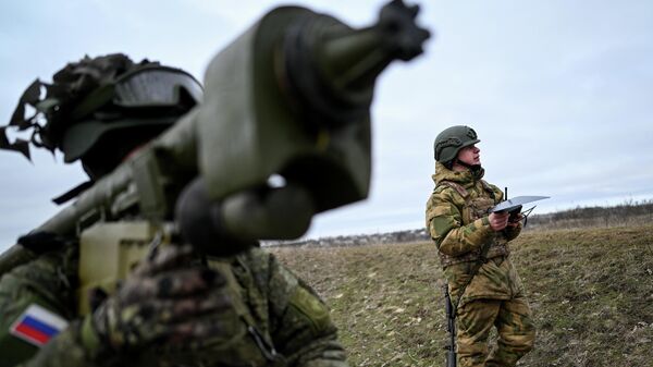 Soldados rusos en la zona de la operación militar especial  - Sputnik Mundo
