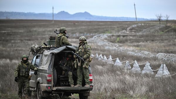 Soldados rusos en la zona de la operación militar especial - Sputnik Mundo