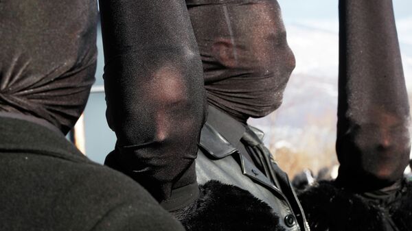 Участники карнавала перед началом шествия в деревне Вевчани на юго-западе Северной Македонии накануне дня святого Василия православного - Sputnik Mundo