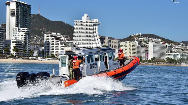 Rescatan a tres personas privadas de su libertad al oeste de México: hay más de 30 detenidos - Sputnik Mundo