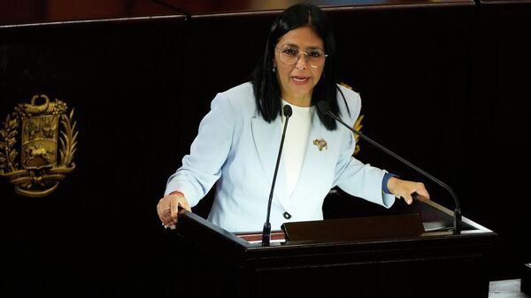 La presidenta encargada de Venezuela, Delcy Rodríguez, habla durante una ceremonia que marca la apertura del nuevo año judicial en el Tribunal Supremo de Justicia en Caracas - Sputnik Mundo