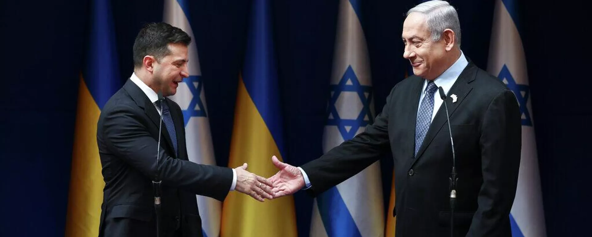 Volodímir Zelenski y Benjamín Netanyahu, primer ministro de Israel Volodímir Zelenski y Benjamín Netanyahu, primer ministro de Israel - Sputnik Mundo, 1920, 14.03.2026