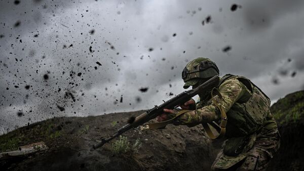 Ejercicios de coordinación de combate de los militares de la 6.ª Brigada Cosaca del Grupo Sur en la zona de la operación militar especial - Sputnik Mundo