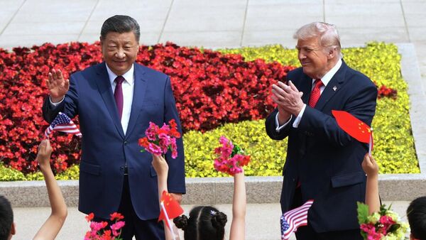 El presidente de EEUU, Donald Trump, y su homólogo chino, Xi Jinping, en el Gran Salón del Pueblo de Pekín.  - Sputnik Mundo