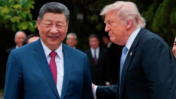 Los presidentes de China y EEUU, Xi Jinping y Donald Trump, el 15 de mayo de 2026 - Sputnik Mundo
