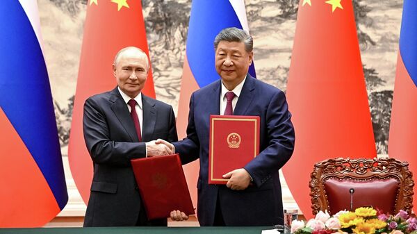 Los mandatarios de Rusia y China, Vladímir Putin y Xi Jinping - Sputnik Mundo