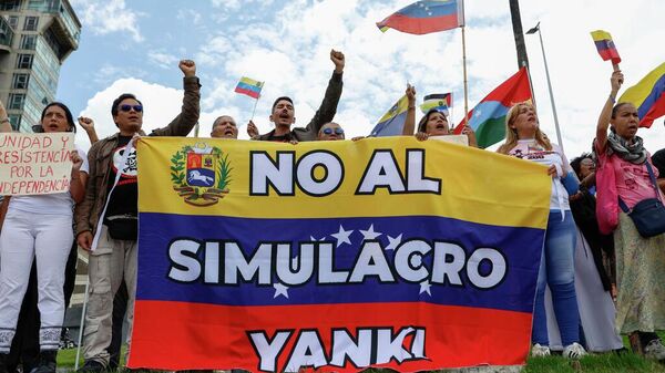 Venezolanos protestan contra el simulacro de los estadounidenses en Caracas, 23 de mayo de 2026  - Sputnik Mundo