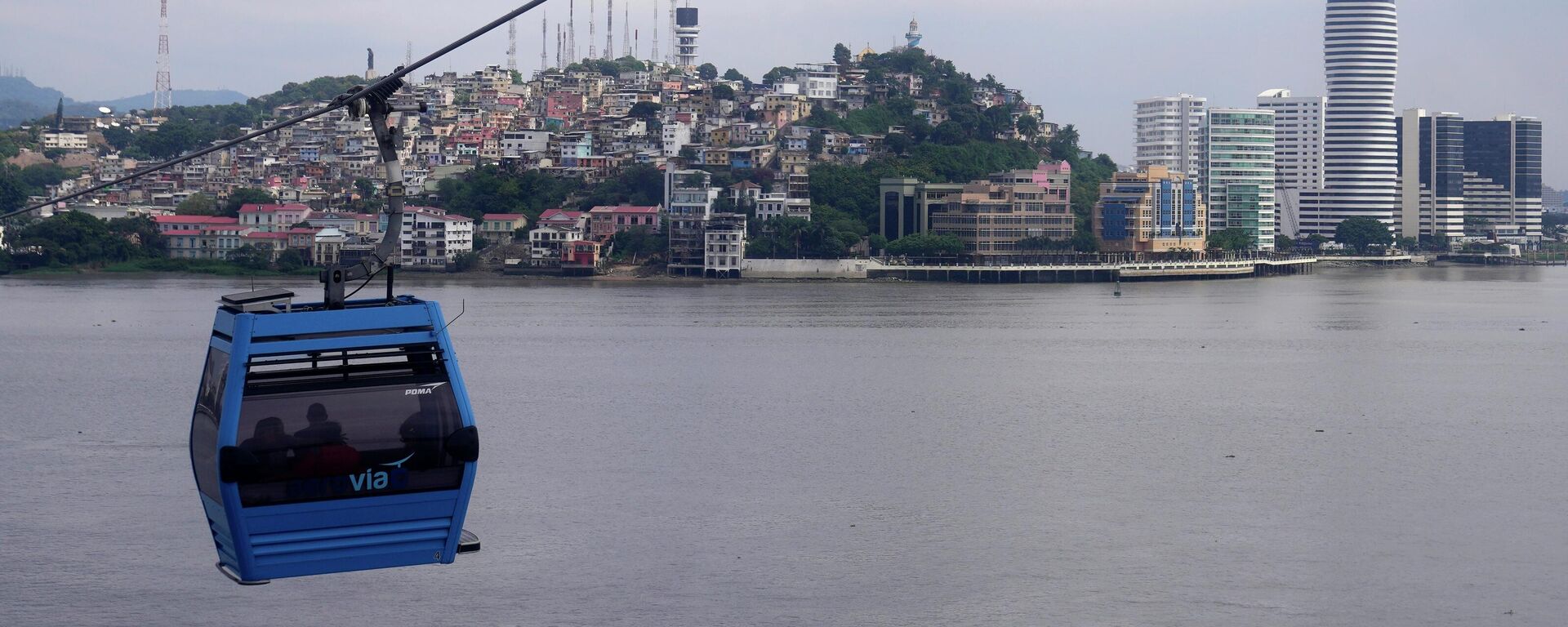 La gente viaja en teleférico sobre el río Guayas en Guayaquil, Ecuador. - Sputnik Mundo, 1920, 10.06.2026