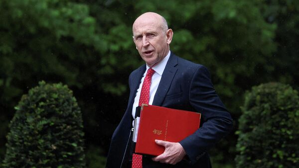 El exsecretario de Defensa del Reino Unido, John Healey - Sputnik Mundo