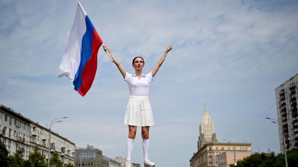 Participantes en el festival deportivo Moscú Olímpica - Sputnik Mundo