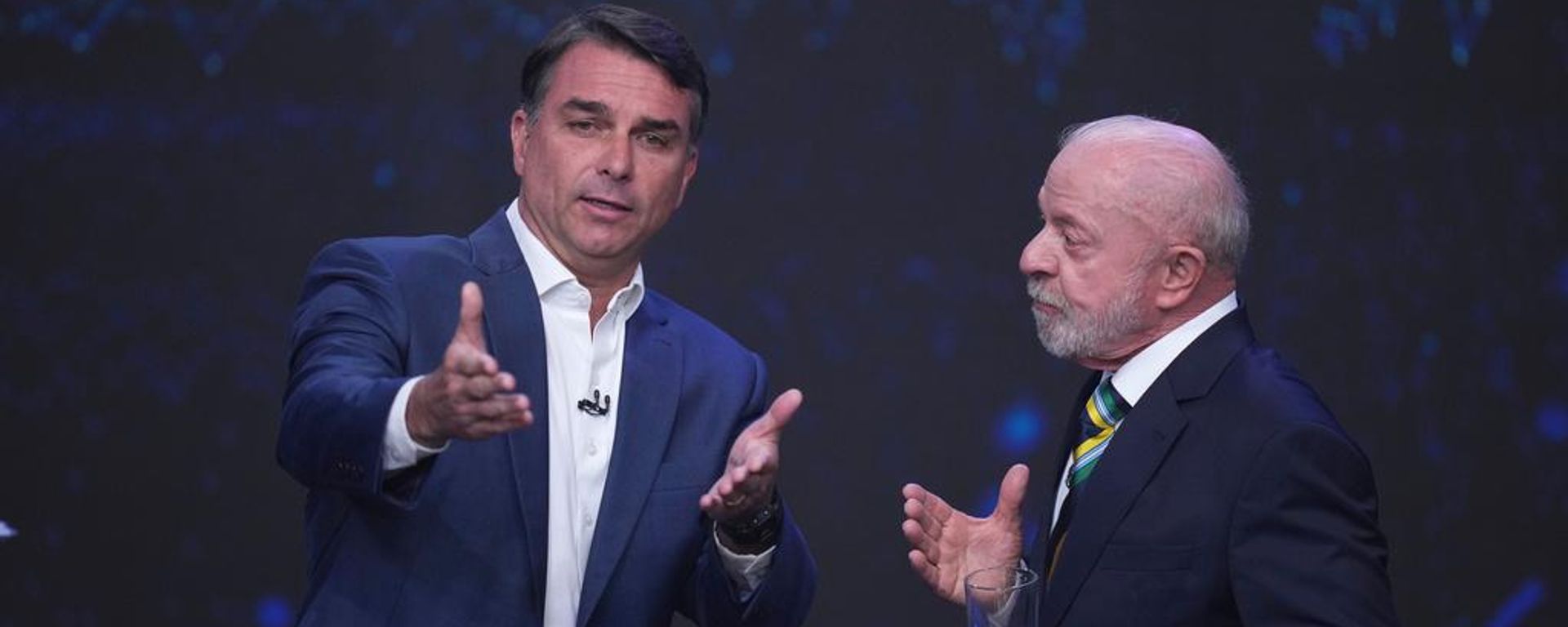 Flávio Bolsonaro y Lula da Silva en su primer debate rumbo a la segunda vuelta electoral en Brasil. - Sputnik Mundo, 1920, 19.10.2026